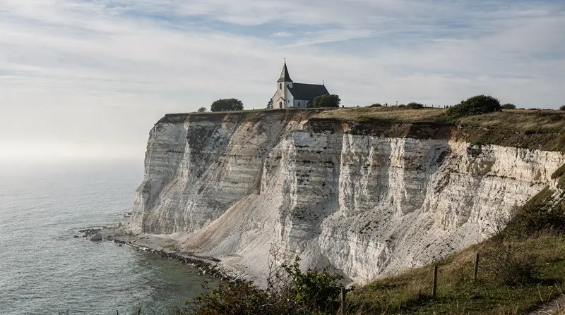 Stevns Klint Day Trip from Copenhagen: UNESCO Cliffs & Højerup — Stevns Klint UNESCO chalk cliffs hold the K/Pg boundary from the dinosaur-ending